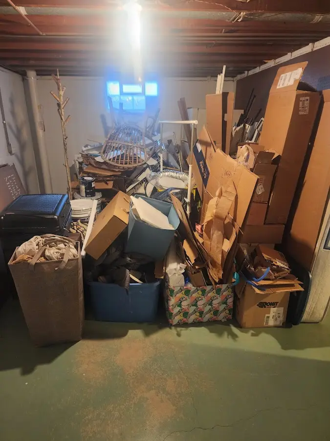 Roll-off dumpster container at job site for 6 Yard Dumpster Rental in Hales Corners